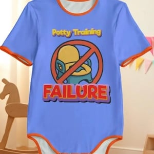 May include: A light blue baby onesie with orange trim. The onesie features the text "Potty Training" above a graphic of a child on a potty seat with a red "no" symbol over it. Below the graphic is the word "FAILURE" in red.