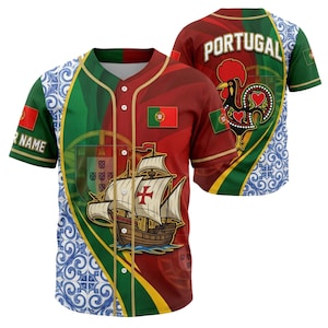 May include: A short-sleeved baseball jersey with a red, green, and white design. The front features a ship, the Portuguese flag, and the text "R NAME". The back displays the word "PORTUGAL" and a rooster illustration.