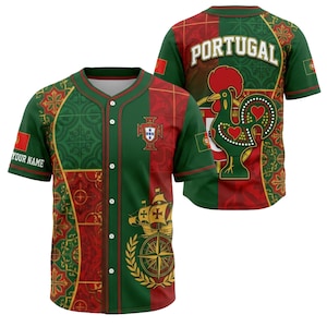 May include: A green and red baseball jersey with a button-up front. The jersey features the word "PORTUGAL" on the back, along with a rooster graphic. The front has a ship and compass design, and the sleeve says "YOUR NAME".