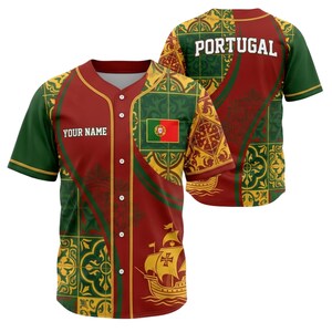 May include: Baseball jersey with a red, green, and gold design. The front features the text "YOUR NAME" and a Portuguese flag. The back of the jersey displays the word "PORTUGAL". A ship graphic is also visible.
