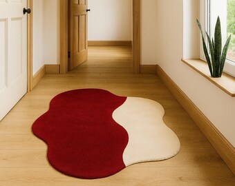 Alfombra de seda tejida a mano: moderna alfombra con bordes ondulados y detalles de lujo
