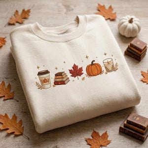 Gezellige herfsttrui met borduursels, shirt met pompoen-, koffie-, boek- en esdoornbladmotief, minimalistische herfsttrui, cadeau voor herfstliefhebbers, cadeau voor Thanksgiving
