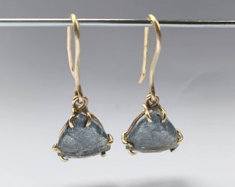 Gold and trillion cut Rutilated Quartz drop earrings.