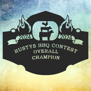 May include: Black metal sign with flames on either side, a rooster, pig, and cow stacked on top of each other, and the text "2024 Rusty's BBQ Contest Overall Champion 2024".