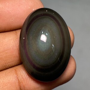 Cabujón de obsidiana de ojo, forma ovalada semipreciosa, obsidiana arcoíris 100 % natural de alta calidad, piedra preciosa suelta para fabricación de joyas, 31 x 22 x 11 mm, 42,10 quilates