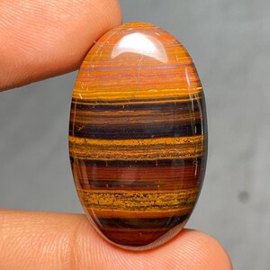 Occhio di tigre in ferro naturale 35x21x6 mm Il ferro di tigre è una combinazione di occhio di tigre, ematite e pietra di diaspro rosso da 50 carati