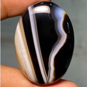 Cabochon en agate rubanée 100 % naturelle, pierre précieuse d'agate rubanée noire de forme ovale, pierre précieuse en vrac faite à la main avec de bonnes sensations 86,60 cts (37 x 25 x 4 mm)