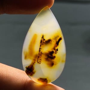 Cabochão de ágata Montana com preço acessível, formato de pera, 40x22x4, ágata preta marrom natural, pedra fina, gema solta Montana, 24,55 quilates