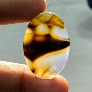 Cabochon de forme ovale en pierre naturelle d'agate du Montana 35 x 23 x 4 agate naturelle brun noir, pierre fine translucide, pierre précieuse du Montana en vrac 26,80 carats