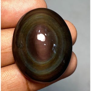 Cabochão de obsidiana olho, formato oval semiprecioso, 100% natural de alta qualidade, obsidiana arco-íris, pedra preciosa solta, joalheria, 33x27x12 mm, 56,90 CTS