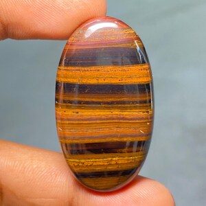 Occhio di tigre in ferro naturale 41x22x6 mm Il ferro di tigre è una combinazione di occhio di tigre, ematite e diaspro rosso, pietra di tigre da 66,70 carati