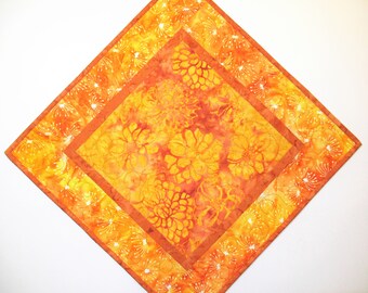 Batik Table Topper in shades of fall, 17x17, wall hanging, quilted, handmade, yellow orange gold, Picket Fence Fabric