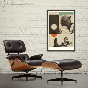May include: A black leather armchair and ottoman set with a wooden frame and a black metal base. A framed art print hangs on the white brick wall behind the furniture. The art print features a collage of images and geometric shapes.