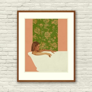 May include: A woman in a bathtub with a floral wallpaper behind her. The wallpaper is green with gold flowers. The woman is looking down and her hand is reaching out of the water.