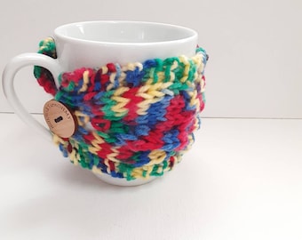 Primaire kleuren kabel gebreide mok gezellig
