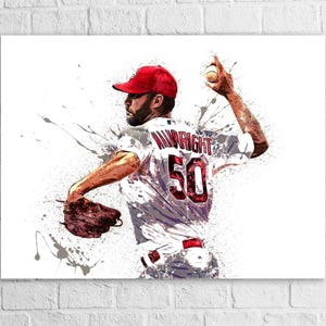 May include: Artwork of a baseball pitcher in a red cap and jersey with the number 50. The pitcher is in mid-throw, with a baseball in hand. The artwork has a watercolour effect with splashes of colour.