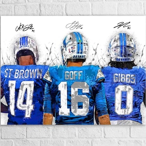 May include: Digital art print showing three American football players in blue jerseys with white numbers and helmets. The players are ST BROWN, GOFF, and GIBBS. Each jersey has the Detroit team logo.