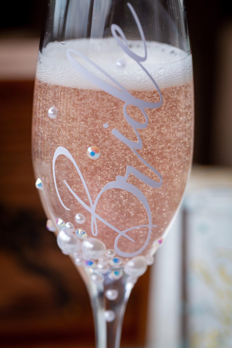 Bride Champagne Glass Custom Bridal Shower Gift Personalized Engagement Flute Rhinestone Pearl Embellished Drinkware Wedding Celebration Keepsake Handmade Prosecco Toast Glass Elegant Sparkling Design Under Twenty Dollars Affordable Bride