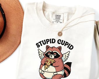 Maglietta Stupid Cupid Raccoon, divertente regalo di San Valentino, unisex, colori comodi