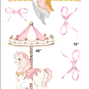 May include: Watercolor illustration of a carousel with a swan, a horse, and pink bows. The swan is 40 inches wide, the carousel is 48 inches wide, and the bows are 10 inches wide. The carousel has a pink and white canopy.
