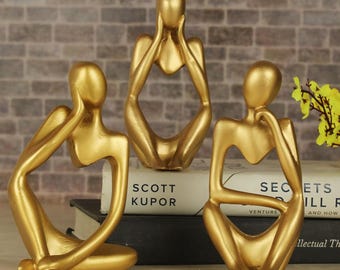 Decorative Handcrafted Indian Modern Abstract Sitting Figure Sculpture, Gold Metallic Finish, Set of- 3