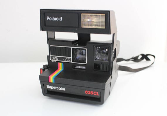 Vintage Polaroid Supercolor 635 CL, with film, Polaroid bag and