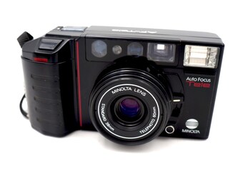 Minolta Auto Focus AF Tele Film Point and Shoot Camera 38mm to