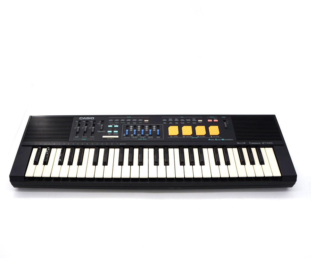 Casio Casiotone MT-220 Piano Keyboard Synth W/ Drumpad