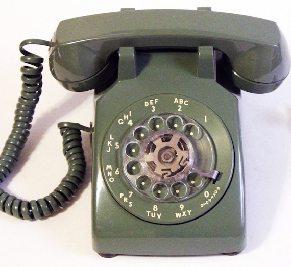 Green rotary telephone made by Western Electric