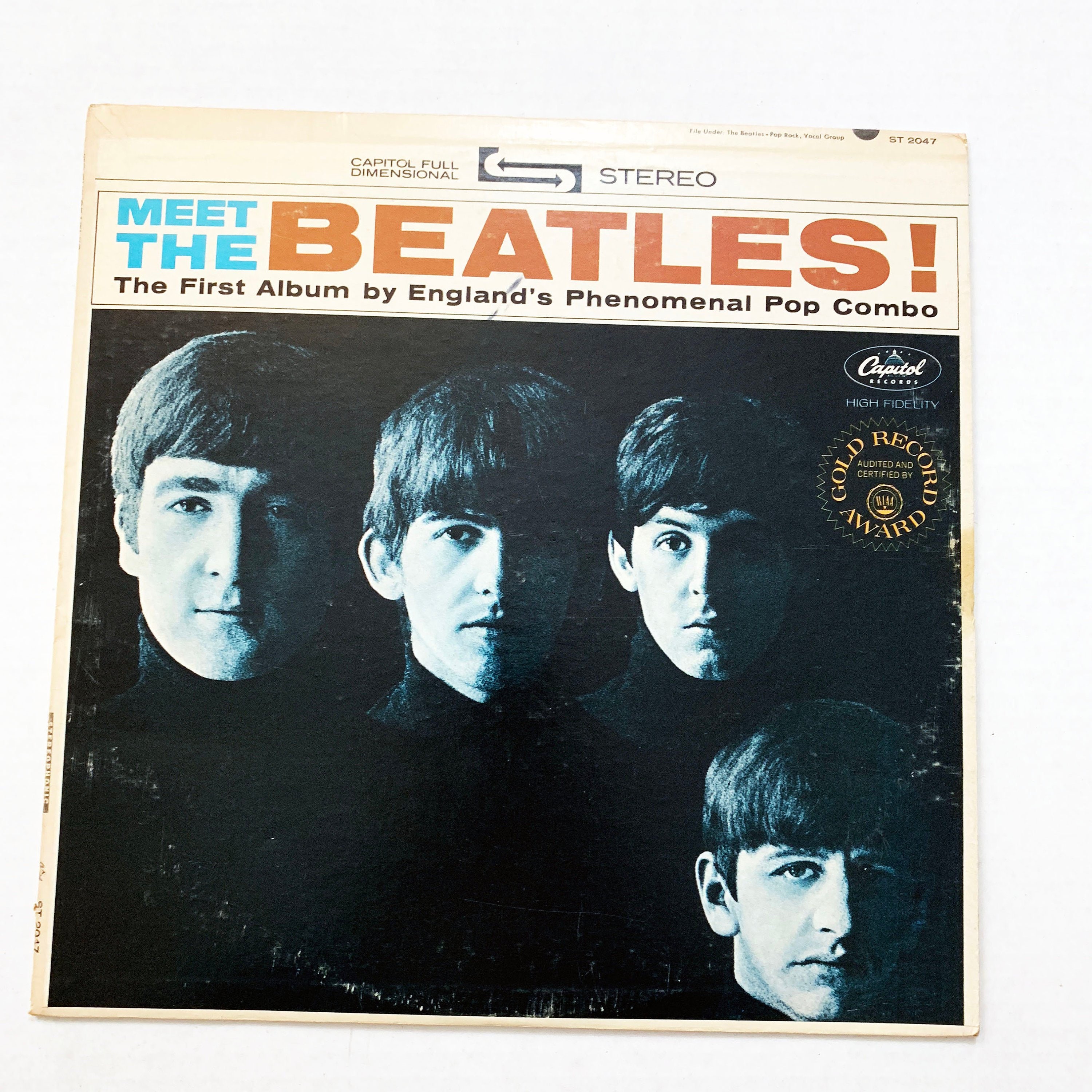 Виниловая пластинка битлз. Beatles &quot;meet the beatles&quot;. яблоко на виниле битлз. битлз яблоко на пластинках. пластинки битлз фото.