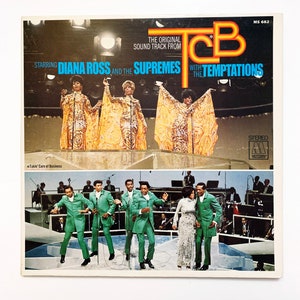 May include: A vintage vinyl record album cover featuring Diana Ross and The Supremes with The Temptations. The cover is yellow, orange, and red with a black and white photo of the groups performing on stage. The album title is "TCB" and the text "The Original Soundtrack From" is printed above the title. The album is from Motown Records.
