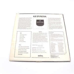 May include: A black and white record album cover with the Guinness logo and text. The back of the album lists the songs included on the record, including "The French Kiss Waltz" and "Whiskey in the Jar".