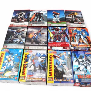 Vintage Lot of 12 Bandai Gundam Action Figure Model Kits Assorted HG & MG Pre-Built 2002 Y2k