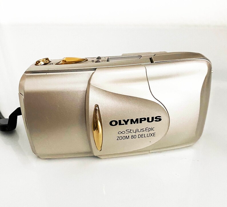 Olympus Stylus 80 DLX lens cover