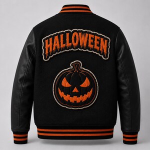 May include: A black varsity jacket with long black sleeves, featuring an orange embroidered pumpkin patch and the word HALLOWEEN in orange lettering on the back. The jacket has orange and black striped ribbed trim on the collar, cuffs, and hem.
