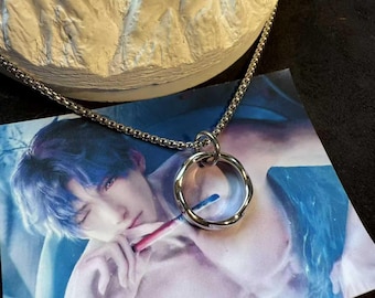 Love and the Deep Space Raphael Let Me Sink necklace, pendant necklace, Mobius strip necklace, ring and necklace can be worn separately.