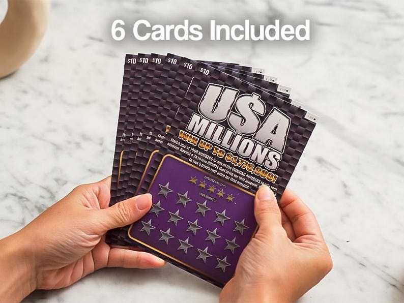 May include: A hand holding a stack of six USA Millions scratch-off lottery tickets. Each ticket is black and purple with the text "USA MILLIONS" and "WIN UP TO $1,776,000!" The tickets are $10 each.