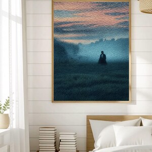May include: A framed art print depicts a solitary figure in a field, bathed in a soft, blue-toned light. The sky transitions from pink to blue, creating a serene and contemplative atmosphere. The artwork is displayed in a bedroom setting.
