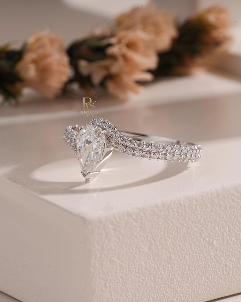 Pear Lab Grown Diamond Engagement Ring With a Sparkling Halo and ...