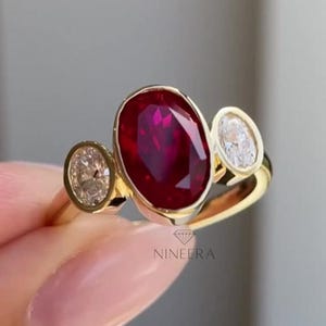 2.5CT Three Stone Ruby Oval Cut Moissanite Engagement Ring 14k Solid Yellow Gold Trilogy Wedding Ring Red Gemstone Ring Promise Ring For Her