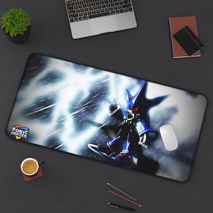 May include: A rectangular mousepad featuring a blue and black character from Sonic Heroes against a backdrop of white lightning. The mousepad has the Sonic Heroes logo in the lower left corner.