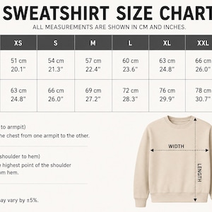 May include: A beige sweatshirt size chart with measurements in centimeters and inches. The chart shows width and length measurements for sizes XS to 3XL. The width ranges from 20.1" to 27.6", and the length ranges from 24.8" to 31.9".