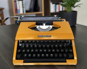 1970s Dutch Sperry Remington 10/50 Yellow Typewriter Working with Case