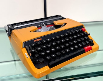 Brother Deluxe 250TR Yellow Vintage 1970s Typewriter with Case Made in Japan
