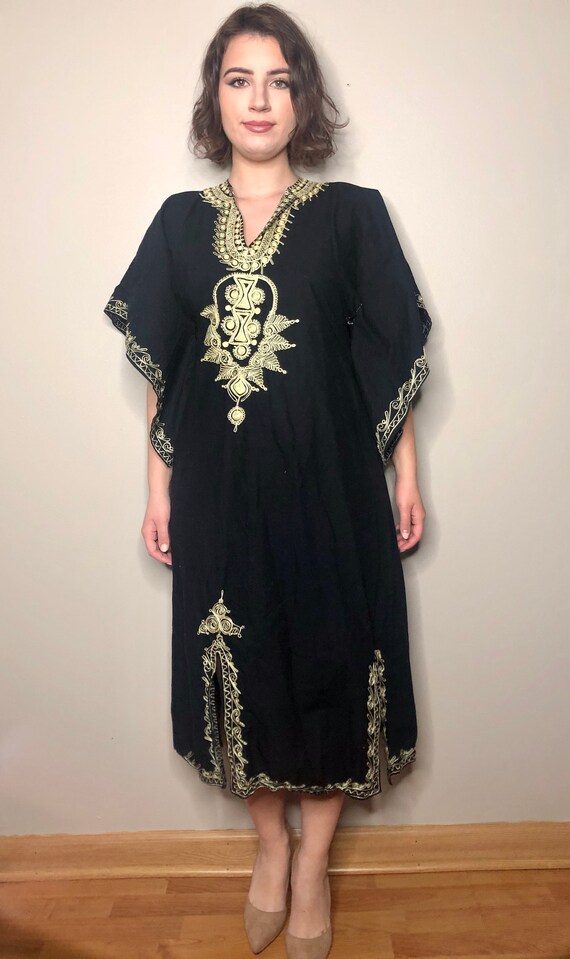black dress with gold detailing Black tulle dress with intricate gold embroidery main image 0