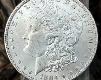 1884 P Morgan Silver Dollar In BU Condition. Flashy Cartwheels With This Beauty!