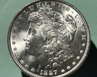 1887 P Morgan Silver Dollar In Mint State BU Condition. Beautiful Coin!