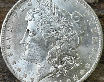 1884 O Morgan Silver Dollar In BU Condition. Discounted For Obverse Bag Marks Barely Visible Without Magnification. Beautiful Morgan!
