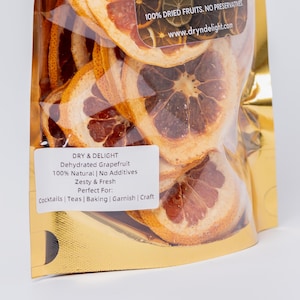 Zesty pink grapefruit slices, air-dried with no additives. Perfect for cocktails, teas, baking, crafts, or gift boxes. All-natural & bold.