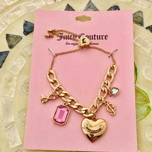 Juicy Couture Gold Plated Charm Bracelet with Pink Gem & Heart